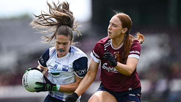 Emma Murray, Waterford, and Siobhán Divilly, Galway, in All-Ireland Ladies Football Championship action. Photo by Piaras Ó Mídheach/Sportsfile