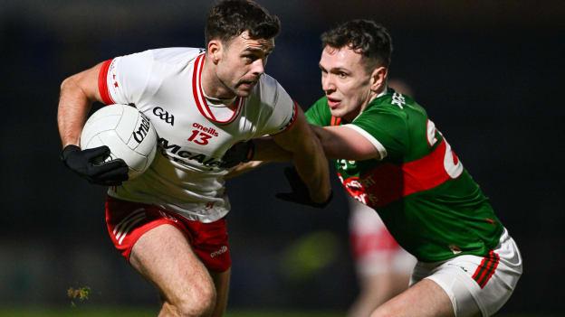 Darren McCurry, Tyrone, and Michael Plunkett, Mayo, in Allianz Football League action. Photo by Ben McShane/Sportsfile