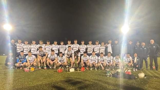 The UL Freshers hurling team and management celebrate after their victory over UCC. 