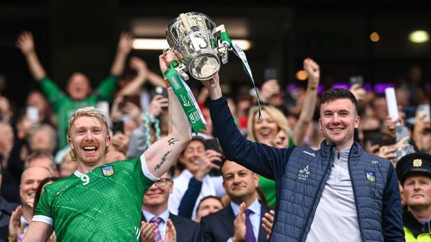 Limerick players Cian Lynch, left, and Declan Hannon lift the Liam MacCarthy Cup after his side's victory in the GAA Hurling All-Ireland Senior Championship final match between Kilkenny and Limerick at Croke Park in Dublin. Photo by Piaras Ó Mídheach/Sportsfile.