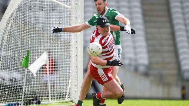 Tommy Childs, Limerick, and Christopher Kelly, Cork, in Munster SFC action at SuperValu Páirc Uí Chaoimh. Photo by Tom Beary/Sportsfile