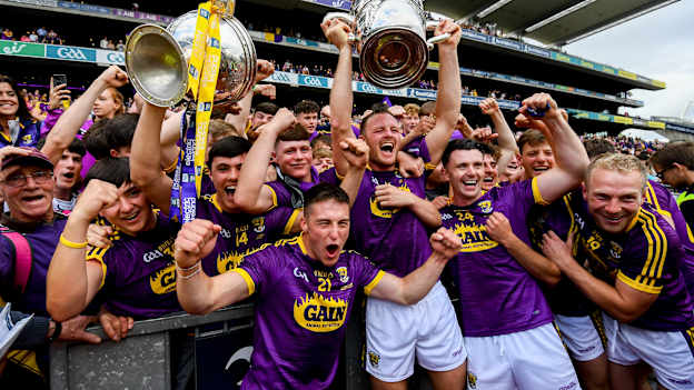 The Wexford senior and minor hurlers celebrate together after their Leinster Final victories in 2019. 