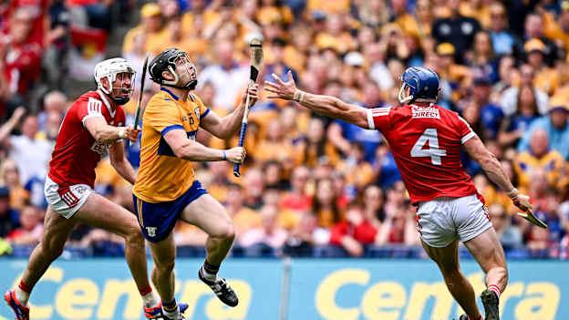  Tony Kelly of Clare evades the tackle of Cork's Seán O'Donoghue on his way to scoring his side's third goal during the GAA Hurling All-Ireland Senior Championship Final match between Clare and Cork at Croke Park in Dublin. Photo by Seb Daly/Sportsfile.