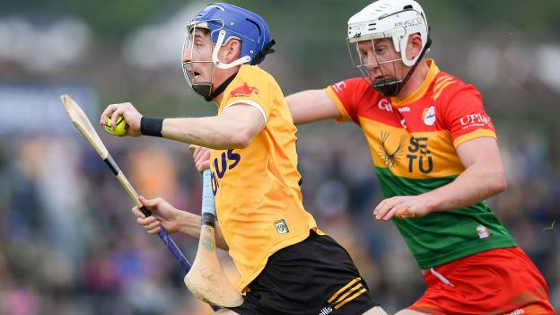 James McNaughton, Antrim, and Kevin McDonald, Carlow, in Leinster SHC action. Photo by Shauna Clinton/Sportsfile