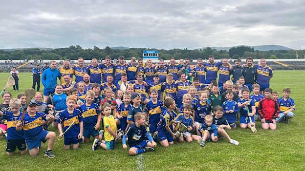 Carnew Emmets players and supporters celebrate after victory in the Wicklow Junior B Hurling Championship Final, the first of six adult county finals the club contests this year. 