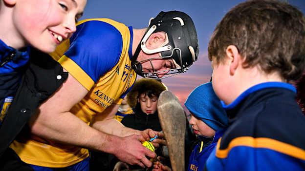 Donal Burke of Na Fianna celebrates with supporter Tiarnan O Dubhlainn after his side's victory in the 2024 AIB Leinster GAA Senior Club Hurling Championship semi-final match between Na Fianna and St Martins at Parnell Park in Dublin. Photo by Sam Barnes/Sportsfile.