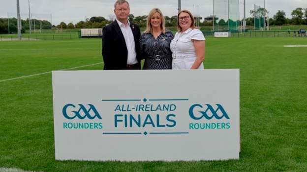 GAA Rounders President Paula Doherty with Camogie Association President Brian Molloy and LGFA President Trina Murray.