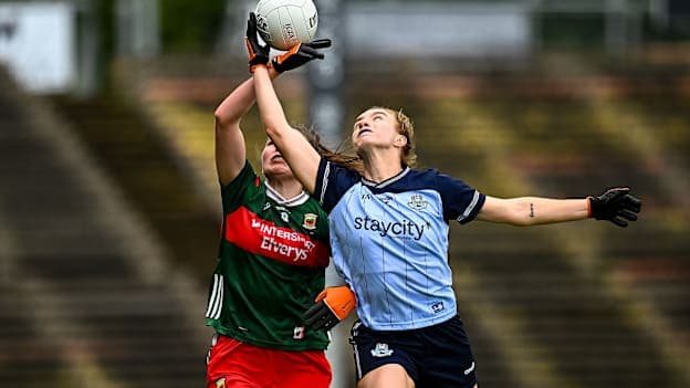 Lauren Magee, Dublin, and Aoife Geraghty, Mayo, in Ladies Football Championship action. Photo by Piaras Ó Mídheach/Sportsfile