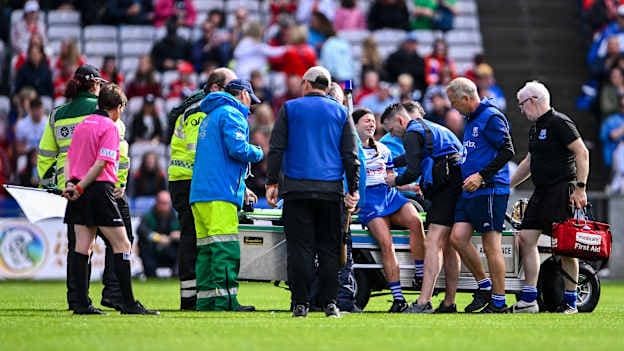 Vikki Falconer of Waterford is helped onto a medical buggy to receive attention after rupturing her ACL during the 2023 Glen Dimplex All-Ireland Camogie Championship Premier Senior Final match between Waterford and Cork at Croke Park in Dublin. Photo by Piaras Ó Mídheach/Sportsfile.