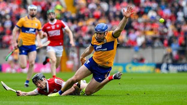 Shane O'Donnell of Clare is tackled by Eoin Downey of Cork during the 2024 Munster GAA Hurling Senior Championship Round 2 match between Cork and Clare at SuperValu Páirc Ui Chaoimh in Cork. Photo by Ray McManus/Sportsfile