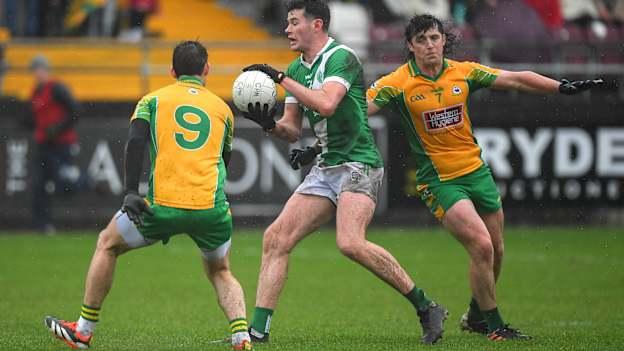 Gerard Davoren, Maigh Cuilinn, and Michael Farragher and Kieran Molloy, Corofin, in action during the Galway SFC Final. Photo: Ray Ryan/Sportsfille