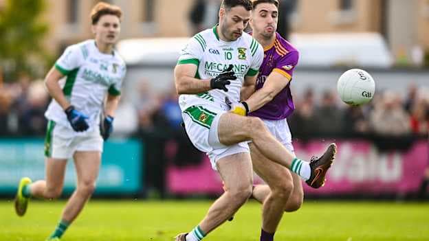 Thomas McGovern, Donaghmore/ Ashbourne, and Sean Penny, Wolfe Tones, in Meath SFC Final action. Photo by Shauna Clinton/Sportsfile