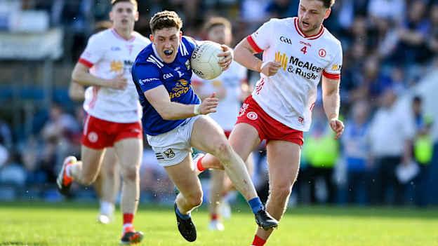 Ciarán Brady of Cavan in action against Michael McKernan of Tyrone during the 2024 Ulster GAA Football Senior Championship quarter-final match between Cavan and Tyrone at Kingspan Breffni in Cavan. Photo by Seb Daly/Sportsfile