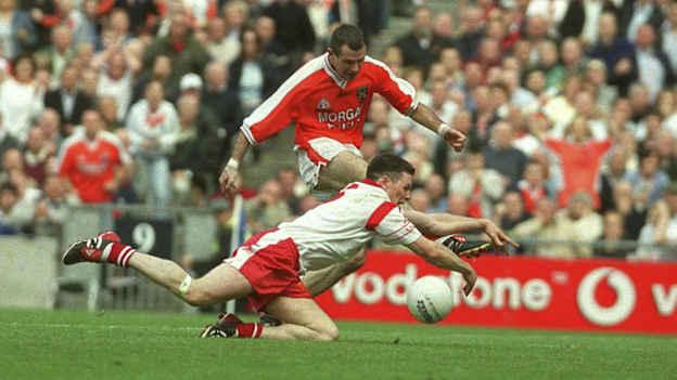 Tyrone's Conor Gormley blocks a late shot from Armagh's Steven McDonnell in the 2003 All-Ireland Senior Football Championship Final, Armagh v Tyrone, Croke Park, Dublin. Photo by Brendan Moran/Sportsfile