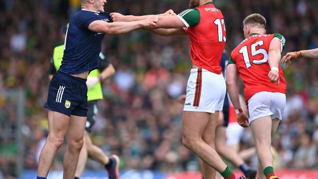 Seán O'Shea of Kerry and Aidan O'Shea of Mayo tussle during the 2023 GAA Football All-Ireland Senior Championship Round 1 match between Kerry and Mayo at Fitzgerald Stadium in Killarney, Kerry. Photo by Piaras Ó Mídheach/Sportsfile