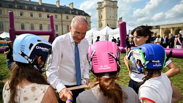 Tánaiste, Minister for Foreign Affairs and Minister for Defence, Micheál Martin, TD, and Maud Pradella of Paris Gaels with attendees at Fesport Festival at the Cháteau de Vincennes during the 2024 Paris Summer Olympic Games. Photo by Sam Barnes/Sportsfile