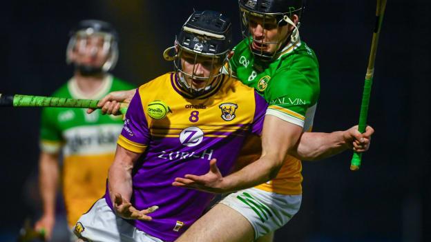 Corey Byrne Dunbar, Wexford, and Cathal King, Offaly, in Allianz Hurling League action. Photo by Tyler Miller/Sportsfile
