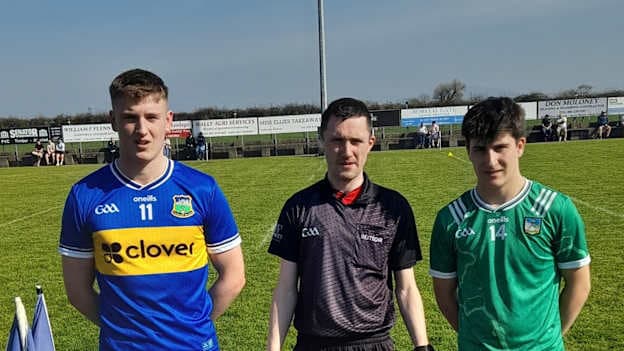 Liam Freaney, Tipperary, and Padraic Phelan, Limerick, pictured with referee James Regan. Photo by Tipperary GAA