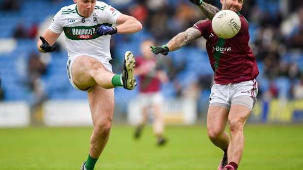 Damon Larkin, Portlaoise, and Jason Moore, Portarlington, in Laois SFC Final action. Photo by Tom Beary/Sportsfile
