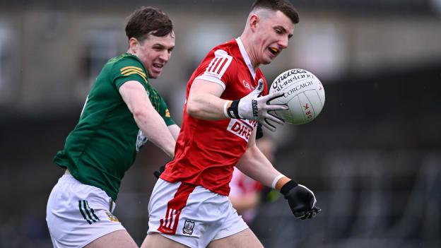 Conor Corbett, Cork, and Adam O'Neill, Meath, in Allianz Football League action. Photo by Ben McShane/Sportsfile