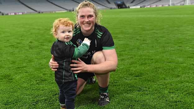 Laura Collins of Clanmaurice celebrates with her son Ruadh Molloy son age 1, after the AIB Camogie All-Ireland Intermediate Club Championship final match between Clanmaurice of Kerry and Na Fianna of Meath at Croke Park in Dublin. Photo by Piaras Ó Mídheach/Sportsfile.
