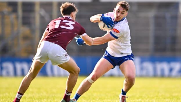 Micheál Bannigan, Monaghan, and Robert Finnerty, Galway, in Allianz Football League action. Photo by Ben McShane/Sportsfile