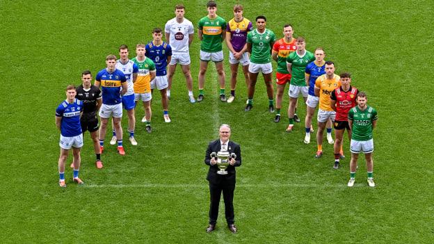 Uachtarán Chumann Lúthchleas Gael Jarlath Burns holding the Tailteann Cup alongside players, from left, Evan O’Carroll of Laois, Niall Murphy of Sligo, Paudie Feehan of Tipperary, Jason Curry of Waterford, Lee Pearson of Offaly, Patrick O’Keane of Wicklow, Darragh Kirwan of Kildare, Barry McNulty of Leitrim, Liam Coleman of Wexford, Josh Obahor of London, Darragh Foley of Carlow, Barry Coleman of Limerick, Paddy Fox of Longford, Dermot McAleese of Antrim, Pierce Laverty of Down and Declan McCusker of Fermanagh in attendance at the launch of the Tailteann Cup 2024 at Croke Park in Dublin. Photo by Piaras Ó Mídheach/Sportsfile