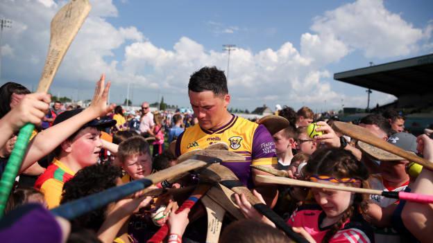 Lee Chin of Wexford signs autographs for supporters after the Leinster GAA Hurling Senior Championship Round 4 match between Carlow and Wexford at Netwatch Cullen Park in Carlow. Photo by Michael P Ryan/Sportsfile.