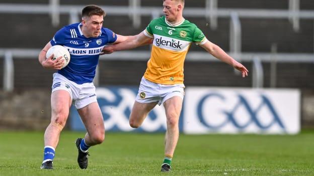 Damon Larkin, Laois, and Peter Cunningham, Offaly, in Leinster SFC action. Photo by Piaras Ó Mídheach/Sportsfile