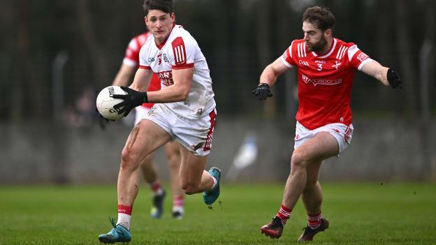 Colm O'Callaghan, Cork, and Dermot Campbell, Louth, in Allianz Football League action. Photo by Ben McShane/Sportsfile