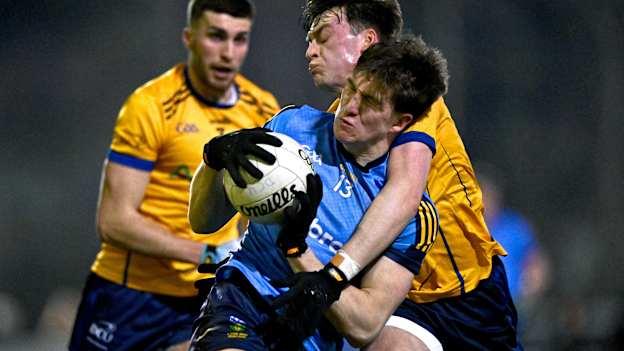 Daire Cregg of UCD is tackled by Bryan Masterson of DCU Dóchas Éireann during the Electric Ireland Higher Education GAA Sigerson Cup Round 2 match between UCD and DCU at Billings Park in Belfield, Dublin. Photo by Ben McShane/Sportsfile