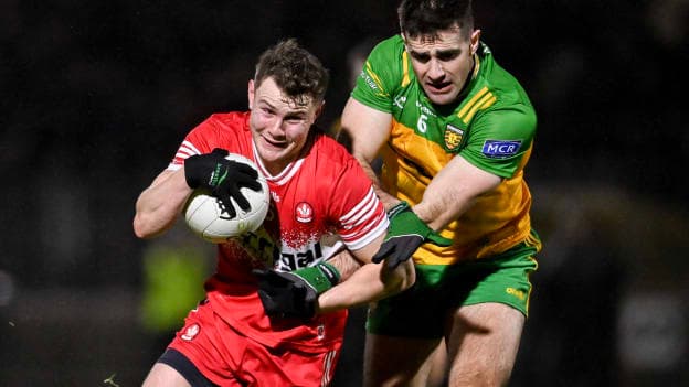 Cormac Murphy, Derry, and Caolan McGonagle, Donegal, in action at O'Neills Healy Park. Photo by Ramsey Cardy/Sportsfile