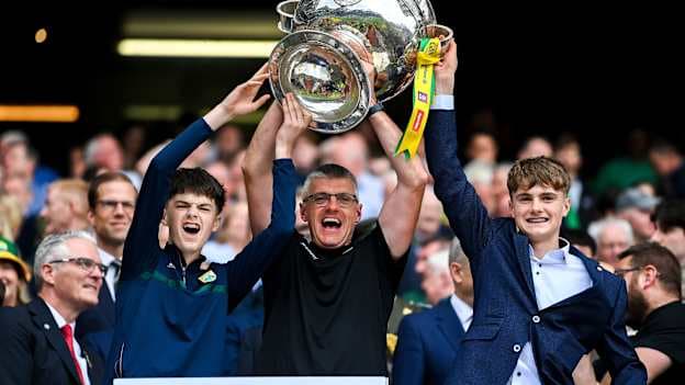 Kerry selector Aodán Mac Gearailt lifts the Sam Maguire cup in celebration following their side's victory in the GAA Football All-Ireland Senior Championship final match between Kerry and Donegal at Croke Park in Dublin. Photo by Stephen McCarthy/Sportsfile.