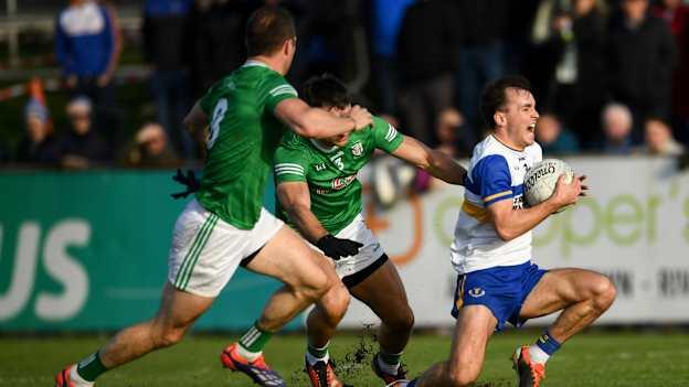Darragh Cavavan, Errigal Ciarán, and Michael McCann, Cargin, in AIB Ulster Club SFC action. Photo by Philip Fitzpatrick/Sportsfile