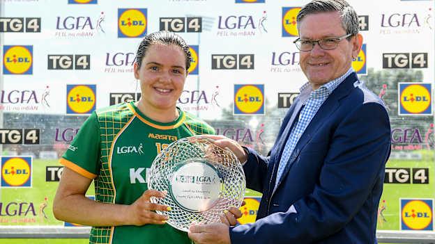 Niamh Gallogly of Meath is presented with her player of the match trophy by Irial Mac Murchu after the TG4 Ladies Football All-Ireland Championship match between Waterford and Meath at Fraher Field in Dungarvan, Waterford. Photo by Matt Browne/Sportsfile.