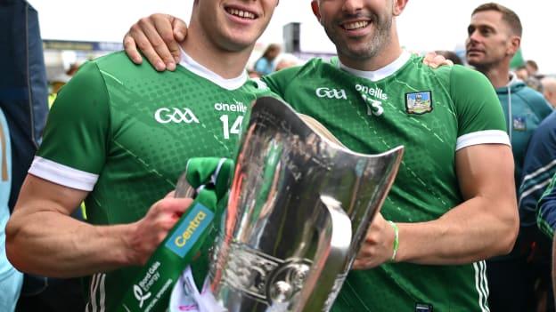 Limerick players, from left, Shane O'Brien and Aaron Gillane celebrate with the Mick Mackey cup after the Munster GAA Hurling Senior Championship final match between Clare and Limerick at FBD Semple Stadium in Thurles, Tipperary. Photo by Brendan Moran/Sportsfile.