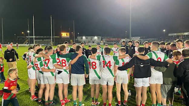 Palatine players pictured in a huddle after their Carlow SFC semi-final victory over Éire Óg. 
