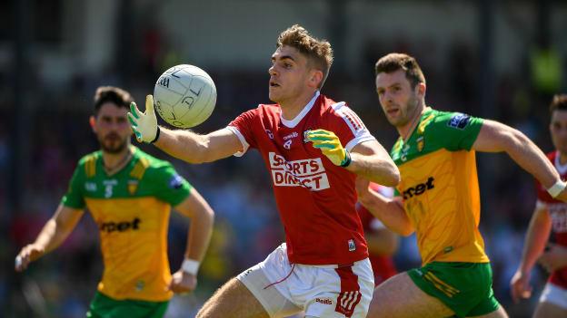 Ian Maguire, Cork, and Eoghan Ban Gallagher, Donegal, in All-Ireland SFC action. Photo by Matt Browne/Sportsfile