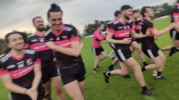 The Na Gaeil Aeracha hurlers celebrate their first championship win. 