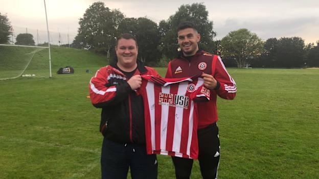 Michael McIvor pictured with Republic of Ireland international John Egan.