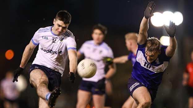 UCD's Diarmuid Moriarty kicks a point against MTU Kerry in the Electric Ireland Sigerson Cup. Photo by Thomas Flinkow/Sportsfile