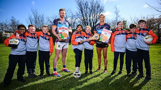 Kellogg’s GAA Cúl Camps ambassadors, Tipperary Hurler Michael Breen, Armagh Footballer Aimee Mackin and pupils from school Holy Trinity Senior National School in Donaghmede, pictured at the launch of the 2026 Kellogg’s GAA Cúl Camps. This year marks 15 years of Kellogg’s sponsorship, celebrated with the launch of the 'Cúl-est P.E. Class' competition. This nationwide initiative offers 4th and 5th class students from 15 schools the chance to win a dynamic Kellogg’s GAA Cúl Camps session at their school. Photo by Shauna Clinton/Sportsfile