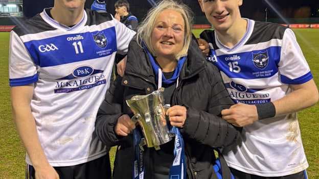 St. Patrick's College, Maghera hurlers Sean and Pádraig O'Kane pictured with their mother Lorraine and the Mageean Cup. 