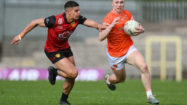 Oisín Conaty, Armagh, and Finn McElroy, Down, in Ulster SFC action. Photo by Stephen McCarthy/Sportsfile