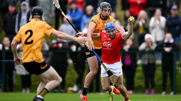 Shane O'Donnell of Éire Óg is tackled by Dylan McMahon of Clonlara on his way to score a goal, in the second minute of the second half, during the Clare Senior Hurling Club Championship Group 1 Round 2 match between Clonlara and Éire Óg Ennis at Pairc an Dalaigh in Tulla, Clare. Photo by Ray McManus/Sportsfile