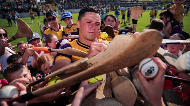 Lee Chin of Wexford signs autographs for supporters after the 2024 Leinster GAA Hurling Senior Championship Round 4 match between Carlow and Wexford at Netwatch Cullen Park in Carlow. Photo by Michael P Ryan/Sportsfile