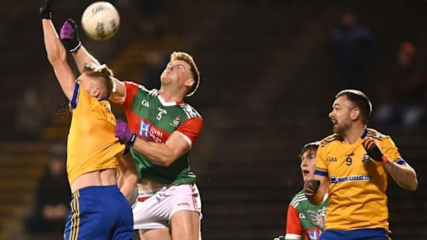 Seán Regan, Ballina Stephenites, and Kieran King, Knockmore, in Mayo SFC Final action. Photo by Piaras Ó Mídheach/Sportsfile