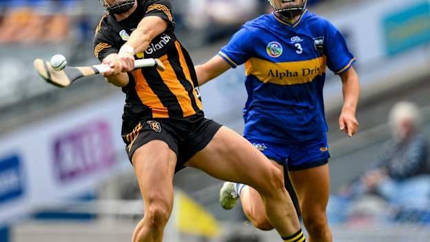 Katie Power of Kilkenny under pressure from Karin Blair of Tipperary scores a point, in the 37th minute, during the Glen Dimplex Senior All-Ireland Camogie Championship quarter-final match between Kilkenny and Tipperary at Croke Park in Dublin. Photo by Ray McManus/Sportsfile.
