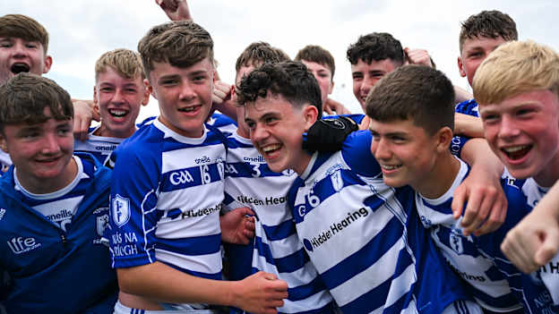 Naas players, including Matthew McCarthy, centre, celebrate after their side's victory in the Football Division 1 final match between Naas and New York at the John West Féile Peile na nÓg Gaelic Football and LGFA National Finals at Derry GAA Centre of Excellence in Owenbeg, Derry. Photo by Shauna Clinton/Sportsfile.