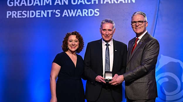 Gerard Bradley of Gortin St Patrick's GAC, Tyrone, is presented with the Ulster Award by Uachtarán Chumann Lúthchleas Gael Jarlath Burns and AIB chief customer officer Elaine Purcell during the GAA President's Awards at Croke Park in Dublin. Photo by Seb Daly/Sportsfile. 